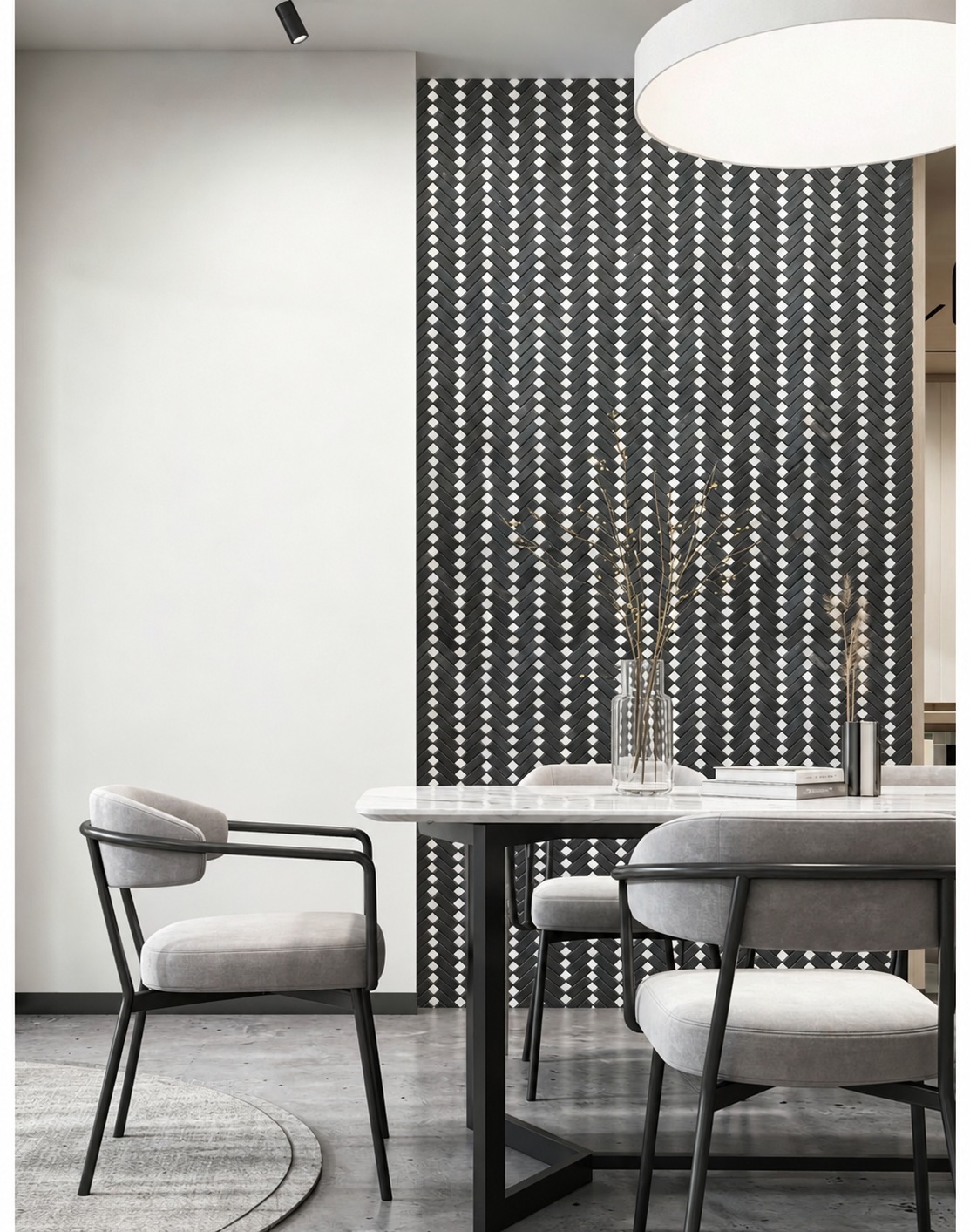 Modern dining room interior with a black and white patterned accent wall, white dining table, and light gray upholstered chairs.